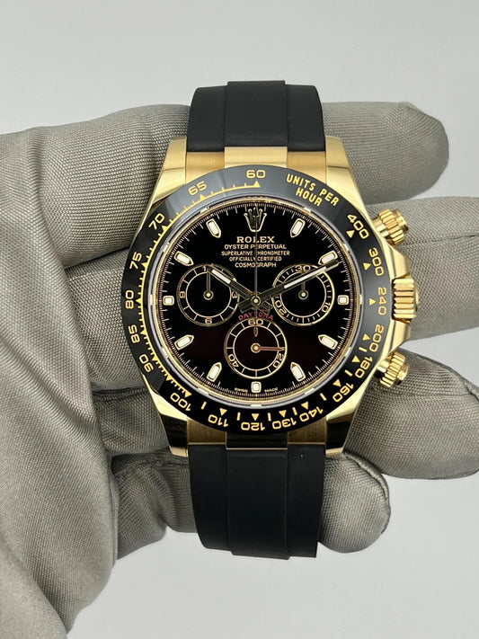 ROLEX DAYTONA YELLOW GOLD, BLACK SPHERE
